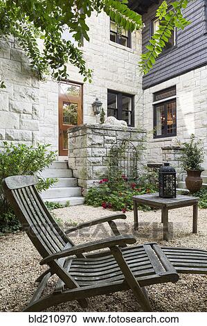 Table and chair in backyard View Large Photo Image Stock Image - Table and chair in backyard. Fotosearch