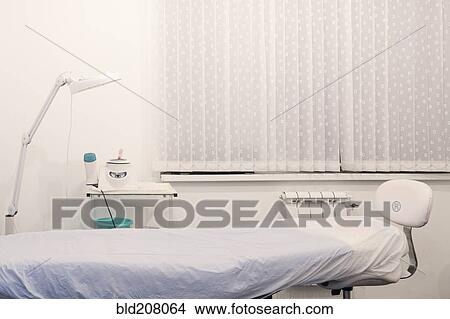 Picture - Table in empty examination room. Fotosearch