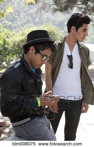 Stock Photography - Teenage boys hanging out. Fotosearch