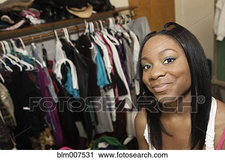 Teenage girl in wardrobe room backstage View Large Photo Image Stock Image - Teenage girl in wardrobe room backstage. Fotosearch