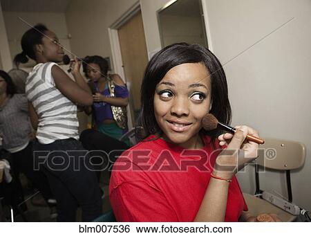 Stock Photograph - Teenagers getting ready backstage. Fotosearch