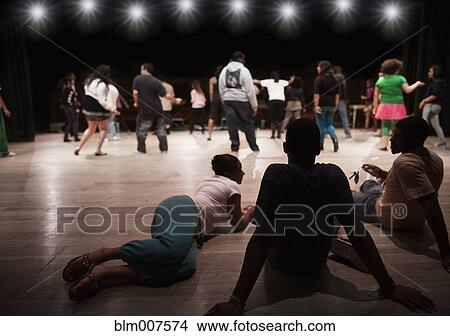 Teenagers rehearsing on stage View Large Photo Image Picture - Teenagers rehearsing on stage. Fotosearch