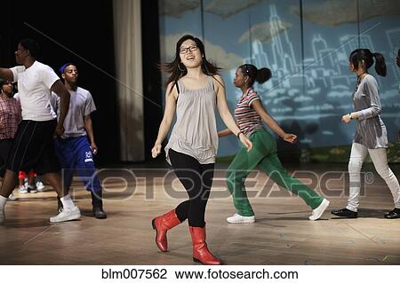 Teenagers rehearsing on stage View Large Photo Image Stock Image - Teenagers rehearsing on stage. Fotosearch