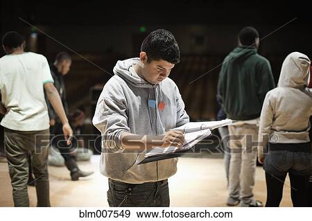 Teenagers rehearsing on stage View Large Photo Image Stock Photo - Teenagers rehearsing on stage. Fotosearch
