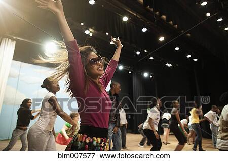 Teenagers rehearsing on stage View Large Photo Image Stock Photo - Teenagers rehearsing on stage. Fotosearch