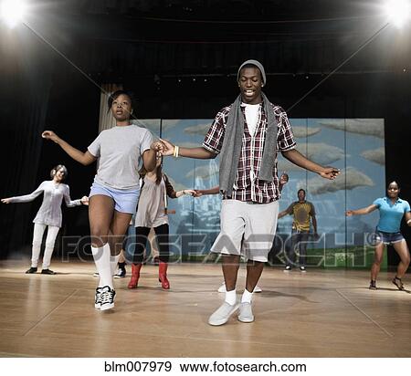 Teenagers rehearsing on stage View Large Photo Image Stock Photo - Teenagers rehearsing on stage. Fotosearch