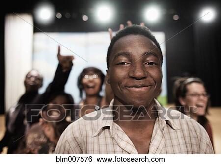 Teenagers rehearsing on stage View Large Photo Image Stock Photograph - Teenagers rehearsing on stage. Fotosearch