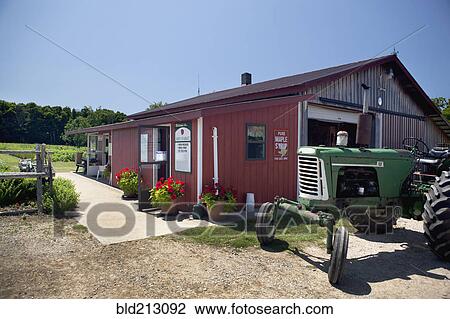 Tractor outside rural farm store View Large Photo Image Stock Image - Tractor outside rural farm store. Fotosearch