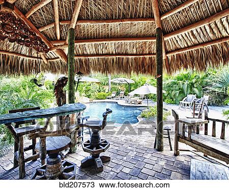Stock Image - Tropical Swimming Pool. Fotosearch