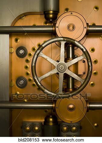 Stock Image - Tumbler on a Vault Door. Fotosearch