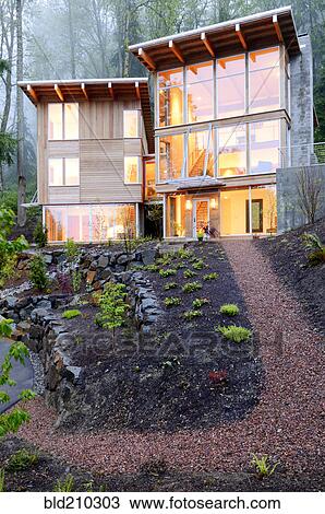Stock Image - Walkway to modern house. Fotosearch