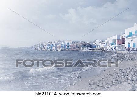 Picture - Waves washing up on beach, Mykonos, Greece. Fotosearch