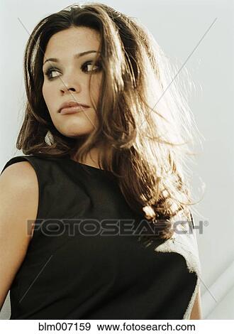 Woman with long hair View Large Photo Image Stock Photo - Woman with long hair. Fotosearch