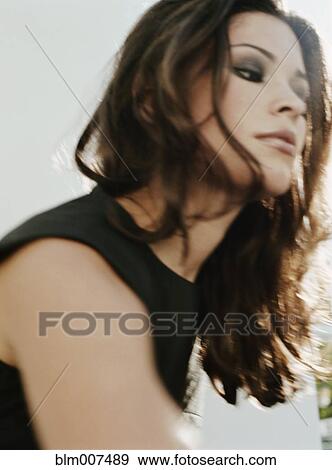 Woman with long hair View Large Photo Image Stock Photo - Woman with long hair. Fotosearch