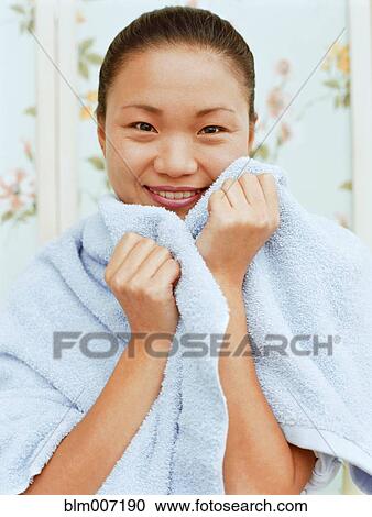 Woman wrapped in towel View Large Photo Image Stock Image - Woman wrapped in towel. Fotosearch