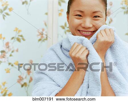 Stock Image - Woman wrapped in towel. Fotosearch
