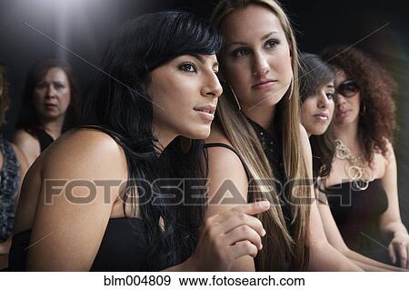 Women watching fashion show View Large Photo Image Stock Photo - Women watching fashion show. Fotosearch
