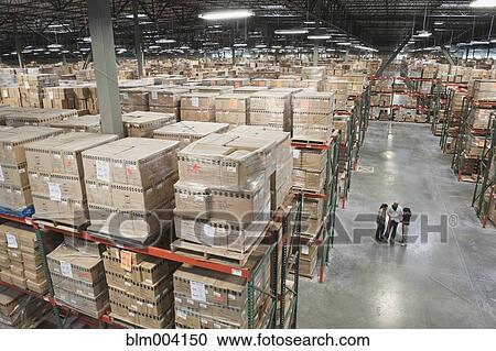 Workers in warehouse View Large Photo Image Stock Image - Workers in warehouse. Fotosearch