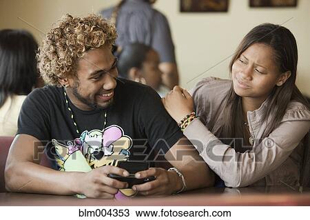 Young couple in diner View Large Photo Image Stock Image - Young couple in diner. Fotosearch