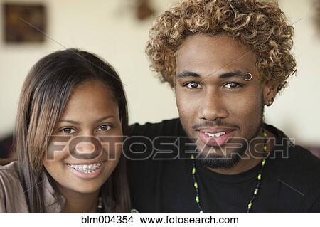 Picture - Young couple smiling. Fotosearch