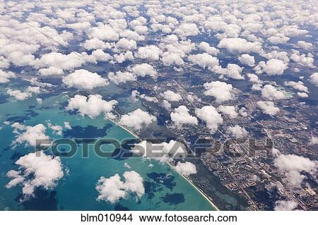 Aerial view of ocean and urban coastline View Large Photo Image Picture - Aerial view of ocean and urban coastline. Fotosearch