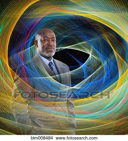 African American businessman surrounded by swirling lines View Large Photo Image Picture - African American businessman surrounded by swirling lines. Fotosearch