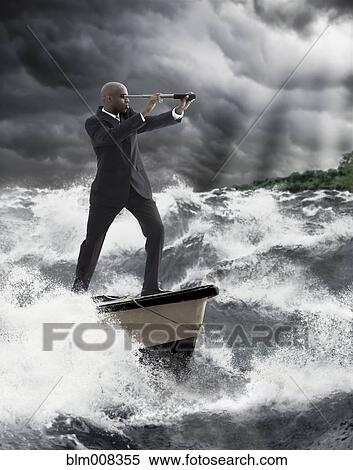 African American businessman using telescope on boat View Large Photo Image Stock Photography - African American businessman using telescope on boat. Fotosearch