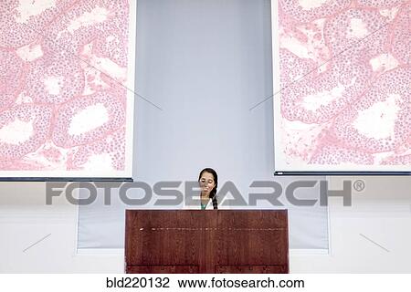 Armenian doctor speaking at podium View Large Photo Image Stock Image - Armenian doctor speaking at podium. Fotosearch