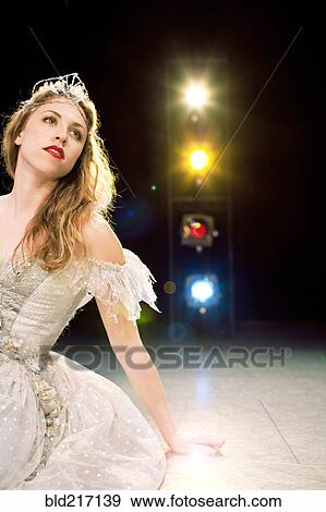Ballet dancer performing on stage View Large Photo Image Stock Photo - Ballet dancer performing on stage. Fotosearch