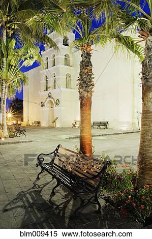 Bench and palm trees near Mision Nuestra Senora del Pilar View Large Photo Image Stock Photography - Bench and palm trees near Mision Nuestra Senora del Pilar. Fotosearch