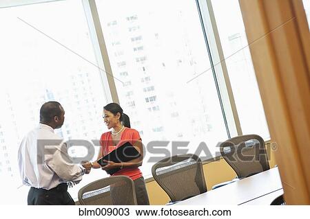 Black businesspeople working in conference room View Large Photo Image Stock Image - Black businesspeople working in conference room. Fotosearch