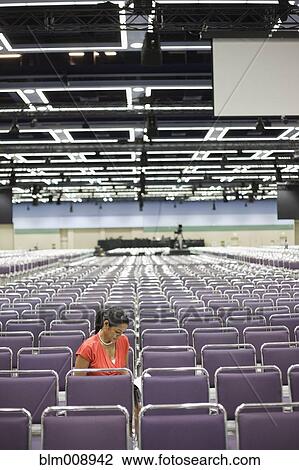 Black businesswoman waiting in empty conference center View Large Photo Image Stock Image - Black businesswoman waiting in empty conference center. Fotosearch