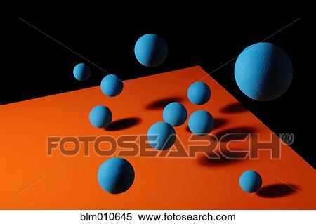 Blue balls bouncing on orange surface View Large Photo Image Stock Photography - Blue balls bouncing on orange surface. Fotosearch