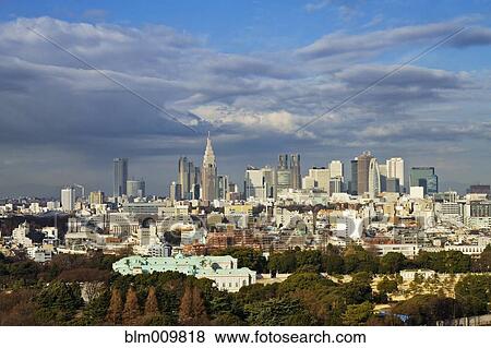 Blue sky over cityscape View Large Photo Image Stock Photo - Blue sky over cityscape. Fotosearch