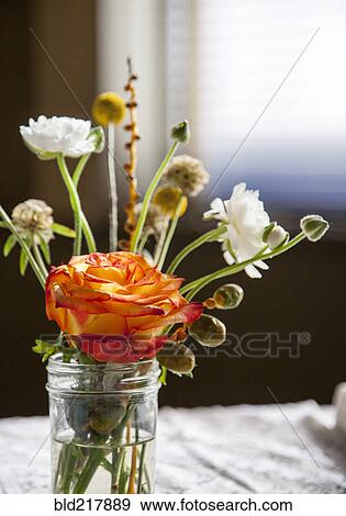 Stock Photo - Bouquet of flowers on table. Fotosearch