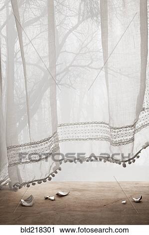 Broken ceramic shards under sheer curtains View Large Photo Image Stock Image - Broken ceramic shards under sheer curtains. Fotosearch