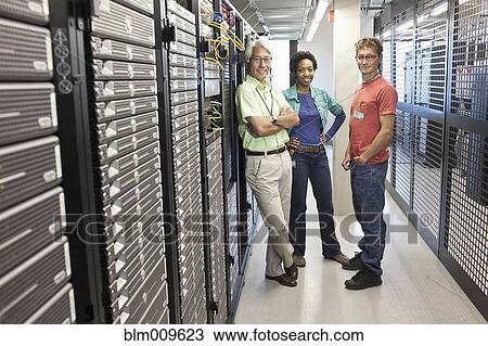 Business people working in office technology room View Large Photo Image Stock Image - Business people working in office technology room. Fotosearch
