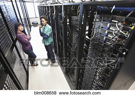 Stock Photo - Businesswoman working in office technology park. Fotosearch