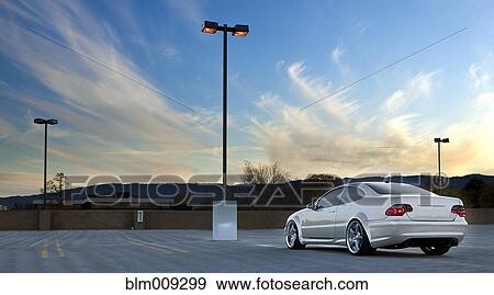 Car parked in empty parking lot View Large Photo Image Stock Photo - Car parked in empty parking lot. Fotosearch