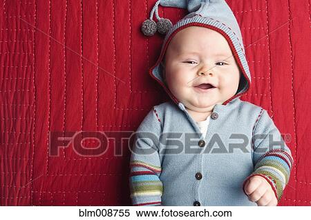 Caucasian baby laying on blanket View Large Photo Image Stock Photography - Caucasian baby laying on blanket. Fotosearch