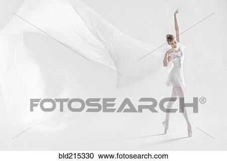 Stock Image - Caucasian ballet dancer dancing on pointe. Fotosearch