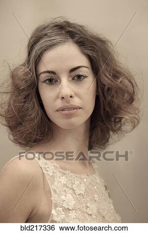 Stock Photograph - Caucasian bride wearing wedding dress. Fotosearch