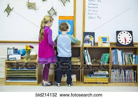 Caucasian children standing in classroom View Large Photo Image Stock Image - Caucasian children standing in classroom. Fotosearch