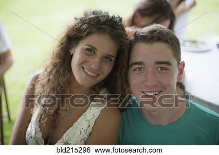 Stock Photograph - Caucasian couple smiling outdoors. Fotosearch