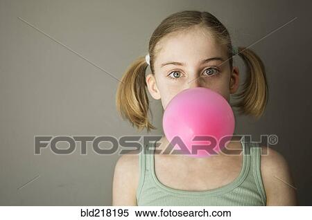 Caucasian girl blowing gum bubble View Large Photo Image Stock Photography - Caucasian girl blowing gum bubble. Fotosearch
