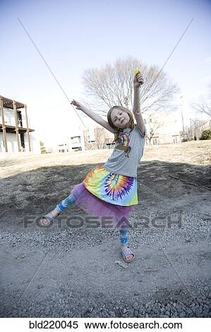 Caucasian girl playing in park View Large Photo Image Stock Photography - Caucasian girl playing in park. Fotosearch