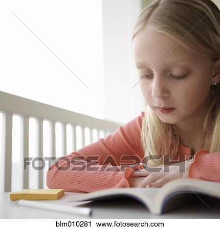Caucasian girl reading book View Large Photo Image Stock Image - Caucasian girl reading book. Fotosearch