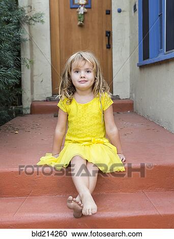 Caucasian girl sitting on front stoop View Large Photo Image Stock Image - Caucasian girl sitting on front stoop. Fotosearch