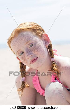 Caucasian girl wearing bathing suit on beach View Large Photo Image Stock Photo - Caucasian girl wearing bathing suit on beach. Fotosearch