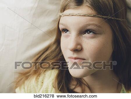 Stock Photo - Caucasian girl wearing braid headband. Fotosearch